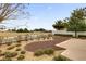 Beautiful backyard overlooking a golf course, featuring manicured landscaping and a charming white fence at 1941 Loadstar Ave, The Villages, FL 32162