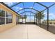 This image highlights a screened lanai with a view, seamlessly blending indoor/outdoor living at 1941 Loadstar Ave, The Villages, FL 32162