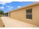 Spacious patio with access to the backyard, offering room for outdoor enjoyment and entertainment at 1941 Loadstar Ave, The Villages, FL 32162