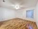 Well-lit bedroom with wood flooring and ceiling fan at 2042 Eagles Rest Dr, Apopka, FL 32712