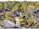 Aerial view of a single Gathering home nestled amongst the trees at 2043 Sawgrass Dr, Apopka, FL 32712