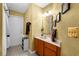 Clean bathroom with single vanity and shower/tub combo at 2043 Sawgrass Dr, Apopka, FL 32712