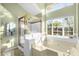 Bright bathroom with a large shower and garden tub at 2043 Sawgrass Dr, Apopka, FL 32712