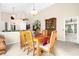 Bright dining room with wood table and chairs, and built-in hutch at 2043 Sawgrass Dr, Apopka, FL 32712