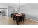 Bright dining room featuring a wooden table with six chairs at 2064 Lula Rd, Minneola, FL 34715