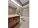 Bathroom with shower/tub combo and patterned tile floors at 208 First St, Tavares, FL 32778