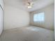 Bright bedroom with carpet, ceiling fan, and window at 2289 Twickingham Ct, Clermont, FL 34711