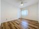 Bedroom with wood-look flooring and a ceiling fan at 2289 Twickingham Ct, Clermont, FL 34711