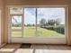 Bright screened porch with view of green space at 2289 Twickingham Ct, Clermont, FL 34711