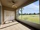 Screened porch overlooking a lush golf course view at 2289 Twickingham Ct, Clermont, FL 34711