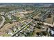 Aerial view of house in community with playground and basketball court at 2320 Blue Meadows Ct, Apopka, FL 32703