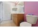 Bathroom featuring a vanity with wood cabinets and a toilet at 2385 Sw 159Th Ln, Ocala, FL 34473