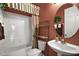 Clean bathroom with tub, toilet, and sink at 2420 Prairie Dunes, Clermont, FL 34711