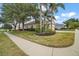 House exterior with palm trees and yard at 2420 Prairie Dunes, Clermont, FL 34711