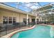 Relaxing screened-in pool with patio at 2420 Prairie Dunes, Clermont, FL 34711