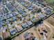 Aerial view of single Gathering home and neighborhood at 2549 Buttonwood Run, The Villages, FL 32162