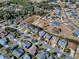 Aerial view of single Gathering home and neighborhood at 2549 Buttonwood Run, The Villages, FL 32162