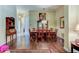 Formal dining room featuring a wood table and hutch at 25921 San Rafael Ct, Howey In The Hills, FL 34737