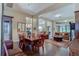 Elegant dining room with hardwood floors and chandelier at 25921 San Rafael Ct, Howey In The Hills, FL 34737