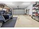 Spacious garage with golf cart and ample storage at 26709 Augusta Springs Cir, Leesburg, FL 34748