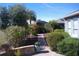 Manicured backyard with brick walkway leading toward house at 314 Salt Marsh Ln, Groveland, FL 34736