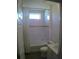 Cozy bathroom featuring a tiled shower-tub combo and neutral color palette at 314 Salt Marsh Ln, Groveland, FL 34736