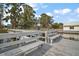 Scenic waterfront view from the dock featuring benches and tranquil waters at 3450 Laurel Dr, Mount Dora, FL 32757