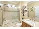 Clean bathroom with tub and shower combo at 370 Salt Marsh Ln, Groveland, FL 34736