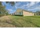 Side view of a house with solar panels, showcasing its design at 370 Salt Marsh Ln, Groveland, FL 34736