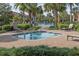 Community spa with seating and landscaping at 370 Salt Marsh Ln, Groveland, FL 34736