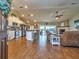 Open floor plan with modern kitchen and cozy living room at 37146 Calhoun Rd, Eustis, FL 32736