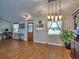 Bright and airy living room with large windows and wood flooring at 37146 Calhoun Rd, Eustis, FL 32736