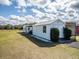 Large white storage shed with ample space for tools and equipment at 37146 Calhoun Rd, Eustis, FL 32736