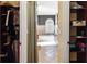 Walk-in closet and bathroom with a bathtub and double vanity at 39248 Tacoma Dr, Lady Lake, FL 32159