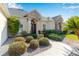 House entrance with landscaping and walkway at 39248 Tacoma Dr, Lady Lake, FL 32159