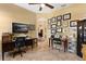 Home office with desk, chair, and art on the walls at 39248 Tacoma Dr, Lady Lake, FL 32159