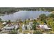 Aerial view of lakefront home and surrounding area at 39645 Turek Ln, Umatilla, FL 32784