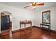 Simple dining room with hardwood floors and antique furniture at 39645 Turek Ln, Umatilla, FL 32784