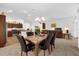 Dining area with table and chairs, open to kitchen and living room at 4348 Tuscaloosa Path, The Villages, FL 32163