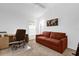 Home office with a sofa and work space at 4348 Tuscaloosa Path, The Villages, FL 32163