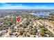 Home's location shown with lake nearby at 460 Brook Ridge Cir, Minneola, FL 34715