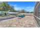 Spacious paver patio with lounge chairs at 460 Brook Ridge Cir, Minneola, FL 34715