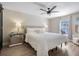 Bright bedroom featuring a king-size bed and ample natural light at 460 Brook Ridge Cir, Minneola, FL 34715