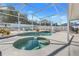 Relaxing pool and spa with screened enclosure at 460 Brook Ridge Cir, Minneola, FL 34715