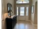 Bright and airy entryway with tiled floors at 5078 Lawler Loop, The Villages, FL 32163