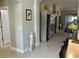 Spacious foyer with decorative statue and built-in shelving at 5078 Lawler Loop, The Villages, FL 32163