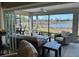 Covered lanai overlooking a peaceful lake at 5078 Lawler Loop, The Villages, FL 32163