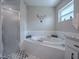 Bathroom features a garden tub, walk-in shower, and granite vanity at 51 Cr 532B, Bushnell, FL 33513