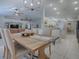 Farmhouse-style dining room with wooden table and chandelier at 51 Cr 532B, Bushnell, FL 33513