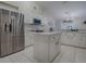 Spacious kitchen featuring stainless steel appliances and an island at 51 Cr 532B, Bushnell, FL 33513